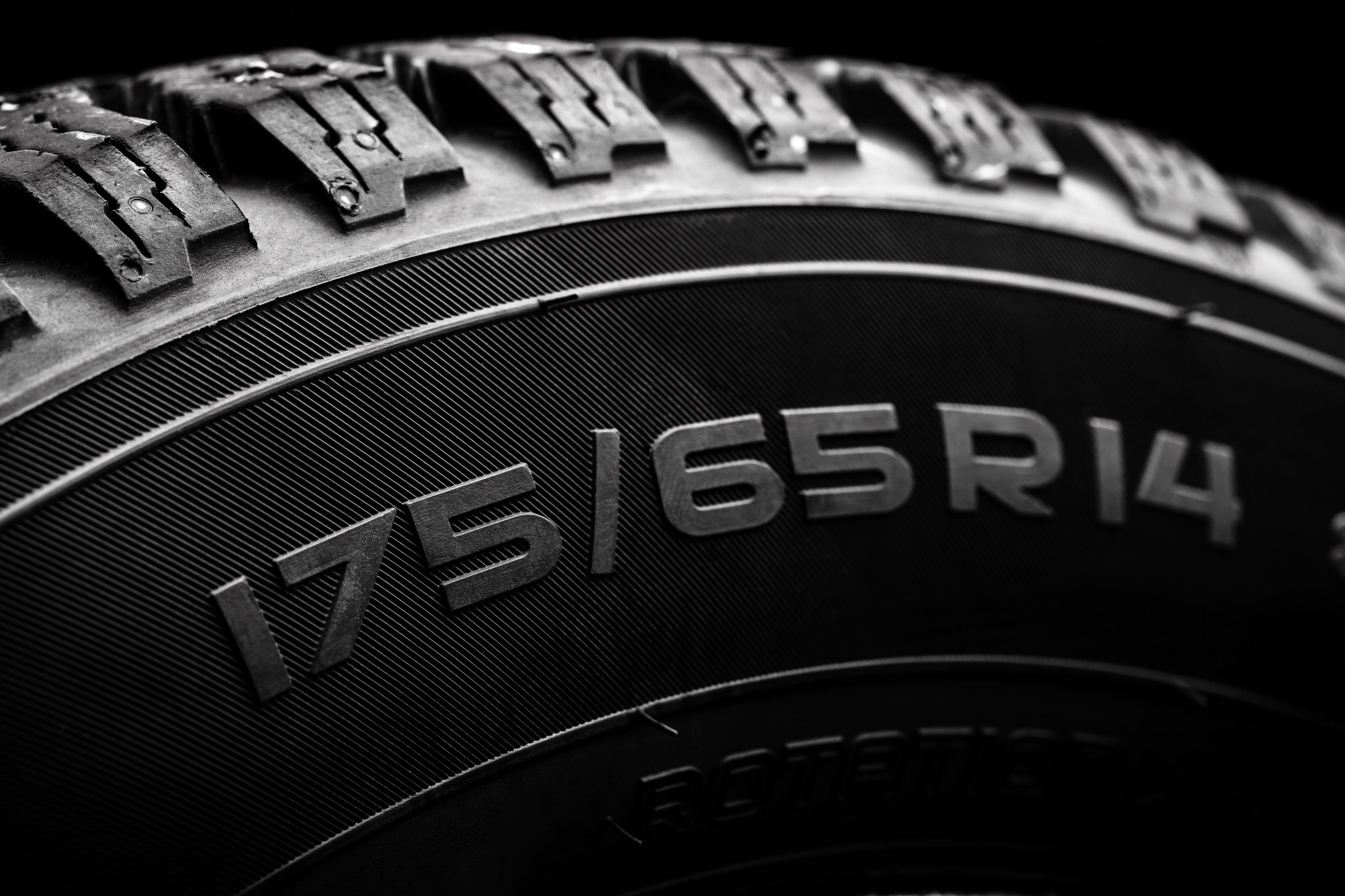 Close up of tire size markings and tread